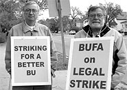 BUFA president Bruce Forrest (left) & vice-president Dennis Oleson on the picket lines in Brandon.