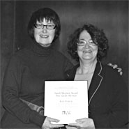 Judy Rebick, right, accepts the Sarah Shorten Award from Paddy Musson, chair of CAUT’s Women’s Committee at the CAUT council meeting Nov. 28.