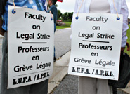 University of Sudbury professors walk the picket line outside the campus on August 18. <em>[Marg Seregelyi / Northern Life]</em>