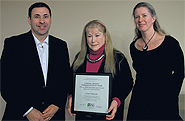 CAUT president Wayne Peters (left) & Erin Patterson, chair of CAUT’s librarians’ & archivists’ committee (right), present Linda Winkler with the Academic Librarians’ Distinguished Service Award.