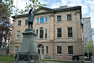 Outside the legislature in Halifax — The McNeil government's spring agenda included an underwhelming first budget in April that critics charge upholds the trend of neglecting the province's post-secondary education sector. [Charles Hoffman / Flickr]