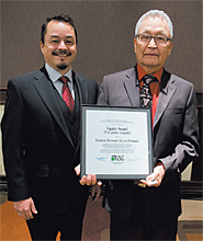Richard Atleo with his son Shawn Atleo, the National Chief of the Assembly of First Nations, after receiving the equity award at the CAUT Council meeting in Ottawa Nov. 30. 