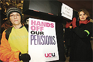 Carrying a symbolic cardboard coffin, University & College Union members from the University of Southampton gathered Oct. 31 to march in mourning at the loss of their pension provisions. (Southern Daily Echo)